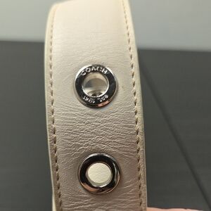 Coach Ivory Leather Strap with Silver Accents